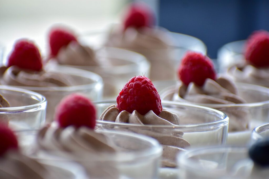 dessert cups with raspberries